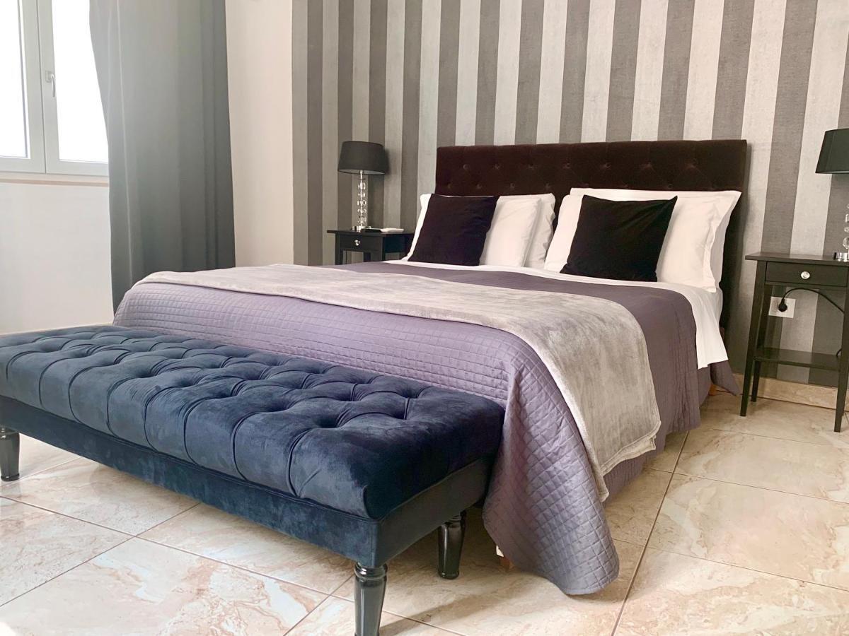 Dimora San Biagio Suites&Apartment Лече Стая снимка